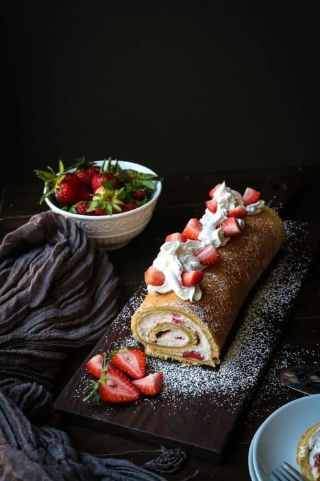 Filled with a Strawberry Cream, this Lemon Cake creates a masterpiece in your mouth.  Lemon Sponge Roll Cake with Strawberry Filling may just be the perfect dessert for your next ladies lunch.  