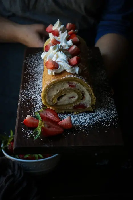 Filled with a Strawberry Cream, this Lemon Cake creates a masterpiece in your mouth.  Lemon Sponge Roll Cake with Strawberry Filling may just be the perfect dessert for your next ladies lunch.  