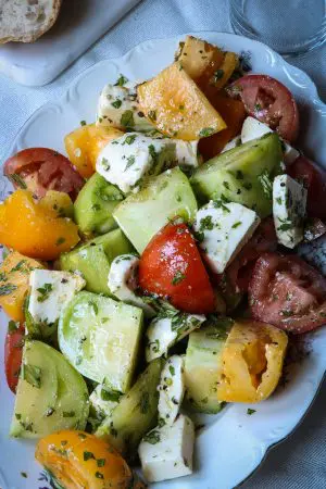 Beautiful summer salad with tomatoes and mozzarella cheese.