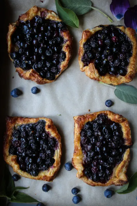 Mini blueberry tarts fresh out of the oven.