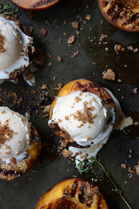 Grilled peaches with scoop of ice cream