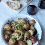 Bowl of chilled potato salad with dijon dressing