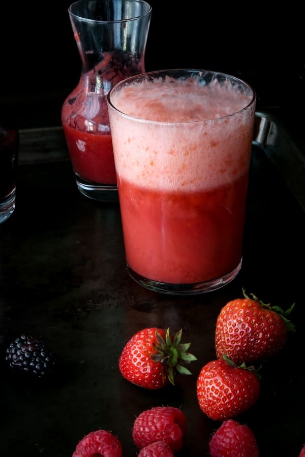 Strawberry raspberry mimosa drink