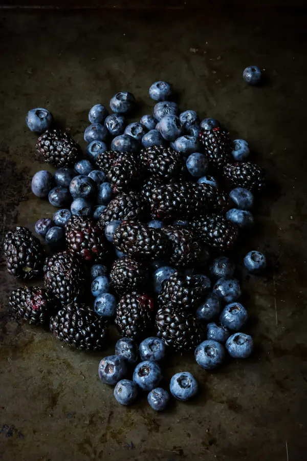 Blackberries and blueberries on a tray