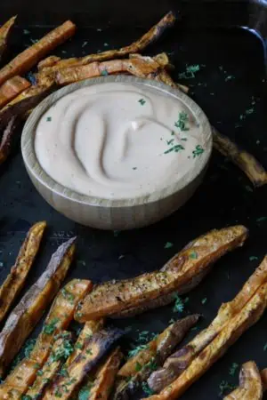 Sweet Potato fries on serving tray with dipping sauce